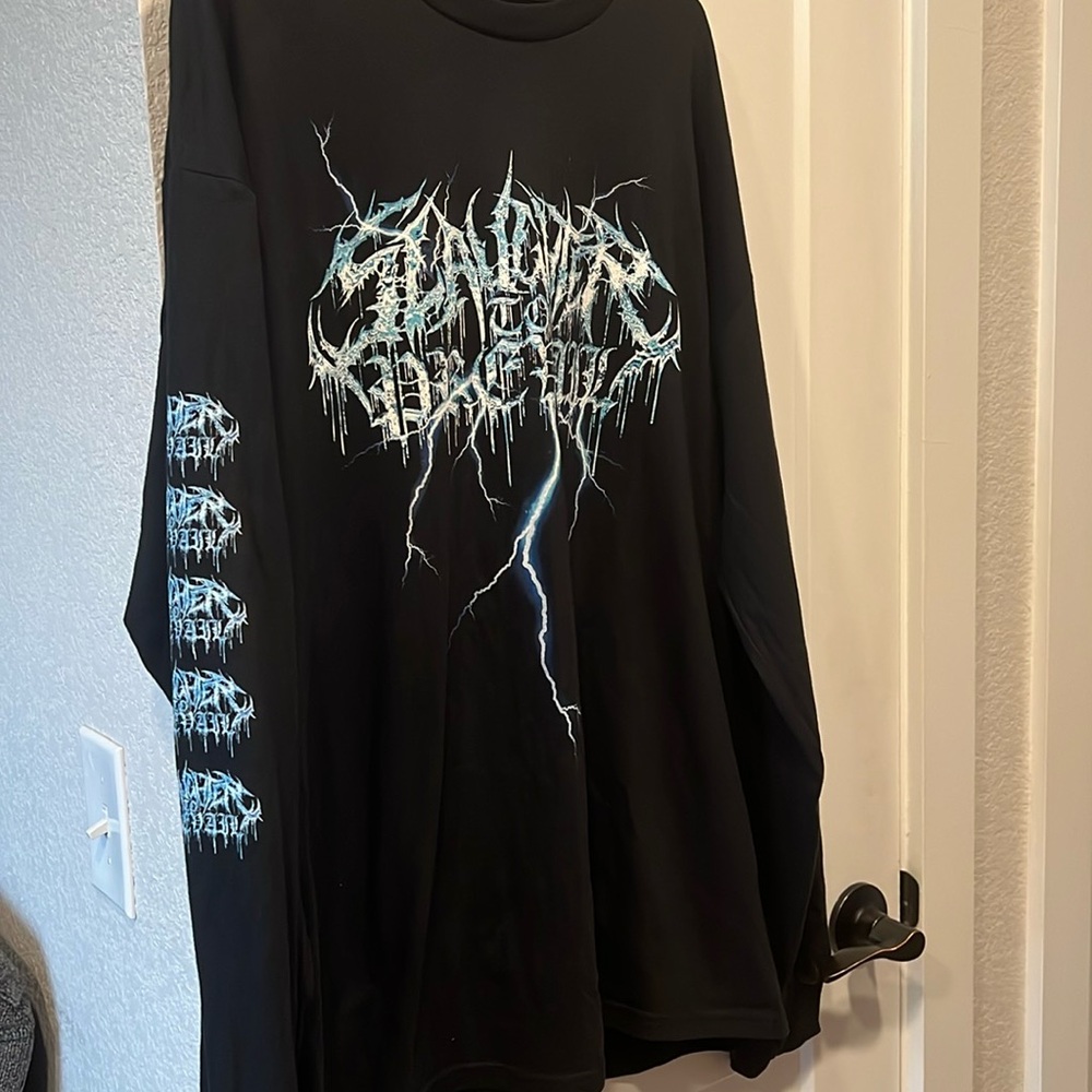 Slaughter to prevail long sleeve blue lightning lettering design band shirt.